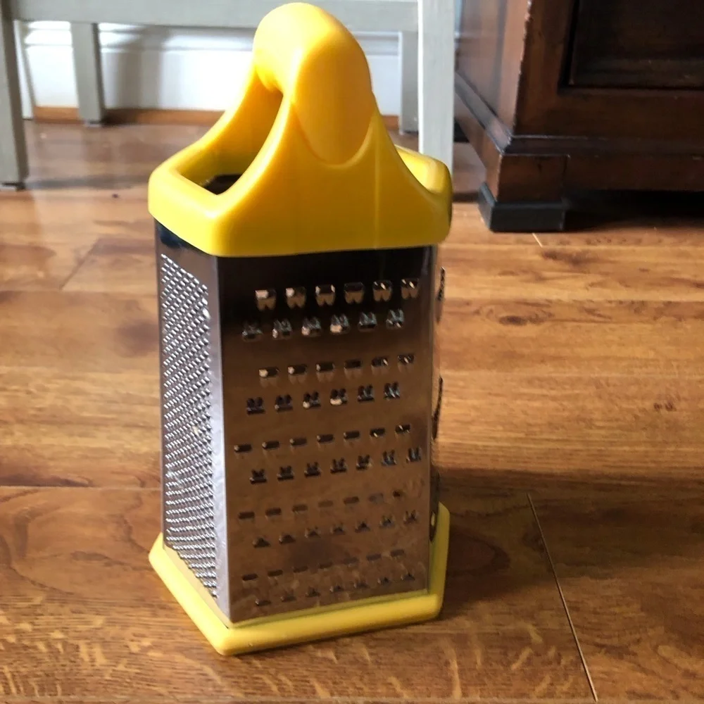 Yellow veggie and cheese grader